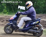 Участник скутерной гонки